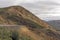 Dirt Road Through a Rugged Mountain Pass