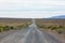 Dirt road running through the middle of the desert and sagebrush