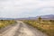 Dirt road running through the middle of the desert and sagebrush