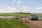 Dirt road spring broken by flood