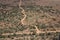 Dirt road winding through arid landscape