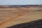 Dirt road winding through the desert of Casper, Wyoming