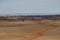 Dirt road winding through the desert of Casper, Wyoming