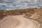 Dirt Road Winds Around Bentonite Hills