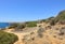 Dirt tracks and rocky landscape of Caminho Da Baleeira nature reserve