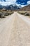 Dirt unpaved road leading through the Alabama Hills in Lone Pine California