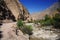 Dirth road with the Andes mountains rising the background in Valley Peru