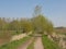 Dirtroad through the flemish contryside on a sunny spring day