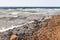 Dirty beach near Aqaba port on Red Sea in winter