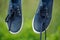 Dirty Blue Sneakers on Clothes Line