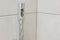 Dirty calcified shower chrome mixer tap, faucet with limescale on it, plaque from hard water. Steel plumbing with fungus