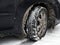 Dirty car tire with snow