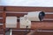 Dirty CCTV cameras are installed on the eaves for detecting property theft.