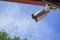 Dirty CCTV cameras are installed on the eaves for detecting property theft. CCTV security camera outdoors