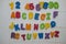 Dirty colorful foam puzzle letters and numbers