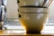 Dirty dishes stacked next to sink in home kitchen