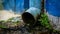 Dirty drainage system tube on facade of the building. Water drain from the roof to the gutter