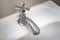 Dirty faucet with stain and limescale