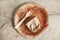 Dirty from food disposable paper utensils on a wooden background. Wooden fork and paper cup with plate on wooden background. Eco