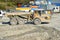 Dirty heavy Volvo dumper loaded by rock moving in work site.