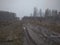 Dirty impassable road travel with a track in autumn in the Siberian taiga