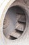 Dirty impeller of a low pressure centrifugal fan in a large supply and exhaust system, the foreground and background are blurred w