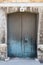 Dirty old blue double door Valletta, Malta