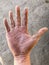 Dirty palm of Asian worker man`s right hand. Skin creases are obvious