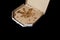 Dirty pizza box isolated on black. cardboard pizza box. greasy stains. unhealthy food concept