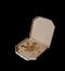 Dirty pizza box isolated on black. empty cardboard box. greasy stains. unhealthy food concept