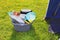 Dirty plates and dishes in the sunshine on a campsite waiting to be washed up