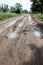 Dirty puddle on the country road