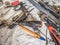 Dirty set of hand tools on a home workbench close up. Home workbench covered with white dirty sheet full of dusty hand