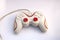 Dirty Used Wired Gamepad Controller with White and Red Accent Isolated in White Background