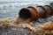 Dirty water from a sewage pipe being pumped into a the ocean