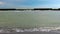 Dirty water and splashing waves on the pier during a storm, the Black Sea