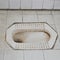 Dirty white squat toilet