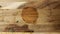 Dirty wooden cutting board with bits of food and circular stain