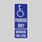 Disabilities Parking only traffic sign. Disabilities person in a wheelchair pictogram. Warning traffic sign in parking