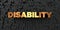 Disability - Gold text on black background - 3D rendered royalty free stock picture