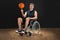 Disabled basketball player spinning ball