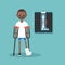 Disabled black man on crutches with broken leg /