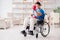 The disabled boxer at wheelchair recovering from injury