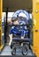 Disabled boy on school bus wheelchair lift