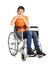 Disabled boy in wheelchair with basketball ball on white background