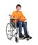 Disabled boy in wheelchair with basketball ball on white background