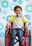 Disabled boy in wheelchair with settings cog gears