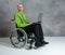 Disabled business man in wheelchair with computer