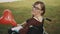 Disabled caucasian young woman with red balloon enjoying autumn breeze