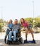 Disabled father playing with children.